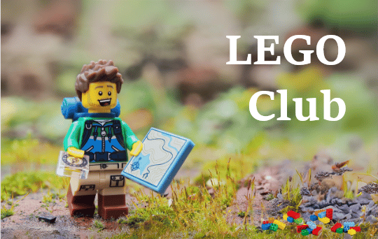 An adventure-style LEGO mini figure holds a map while walking towards pile of LEGO bricks.