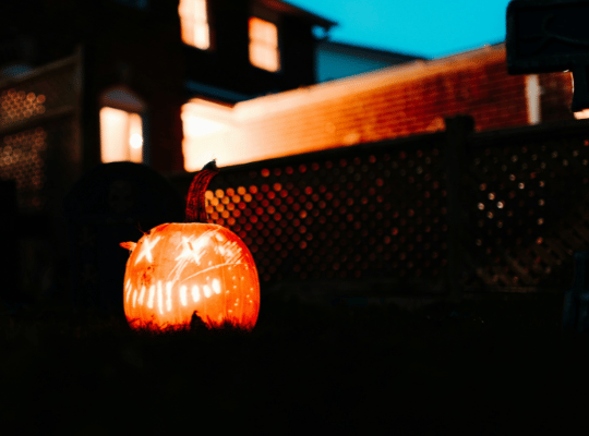 Night seen with lit up jack-o-lantern pumpkin